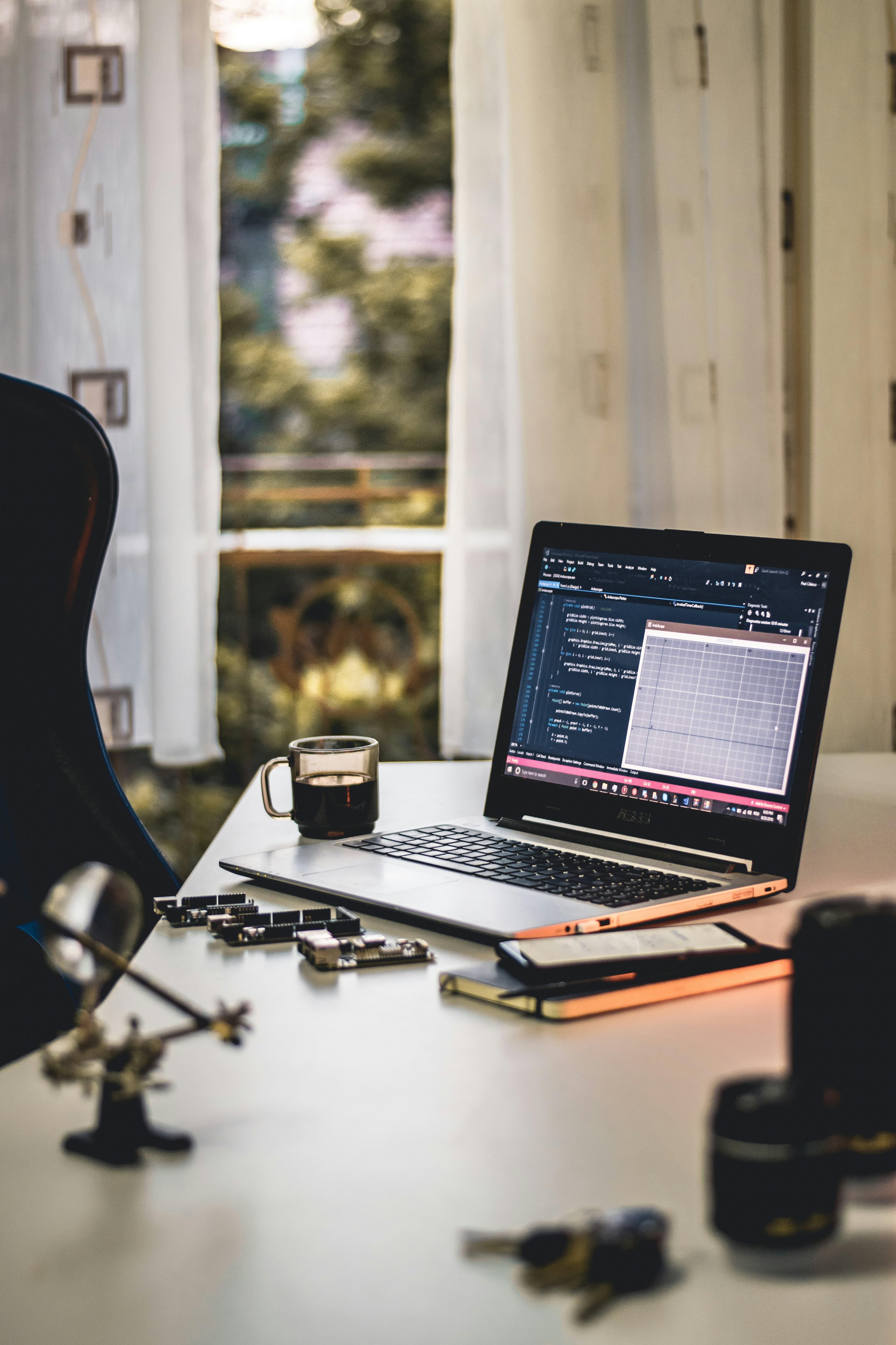 Business analyst reviewing interactive dashboards and performance charts on a screen while planning data-driven decisions